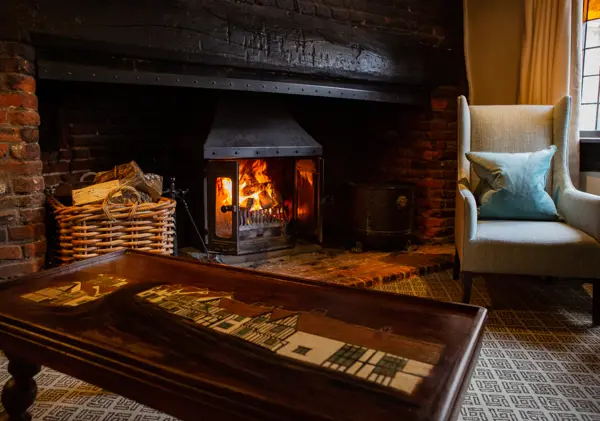 fireplace in the lounge with fire roaring