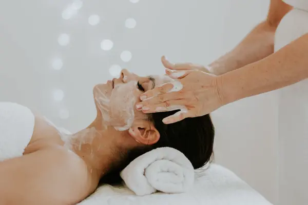 Client enjoying facial treatment