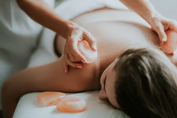 Client having stone massage