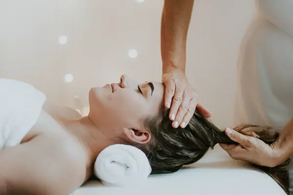 client having facial treatment 