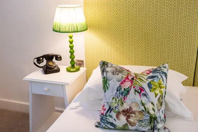 details of cushion and bedside table