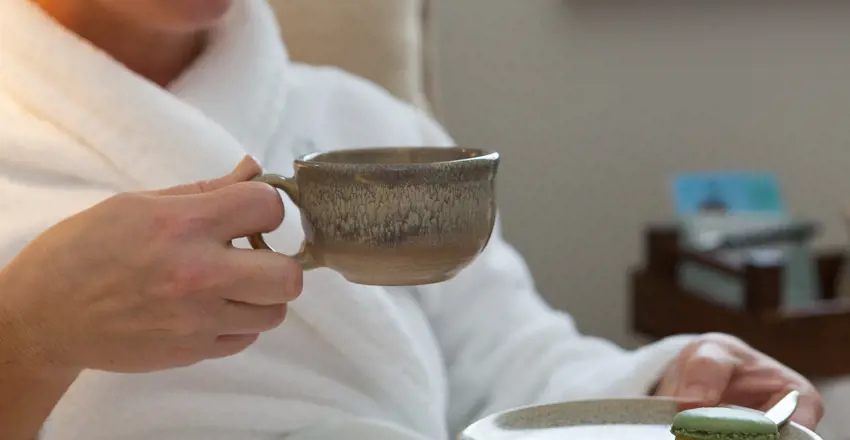 Spa treatments come with a fluffy white robe, loose leaf tea and macaron
